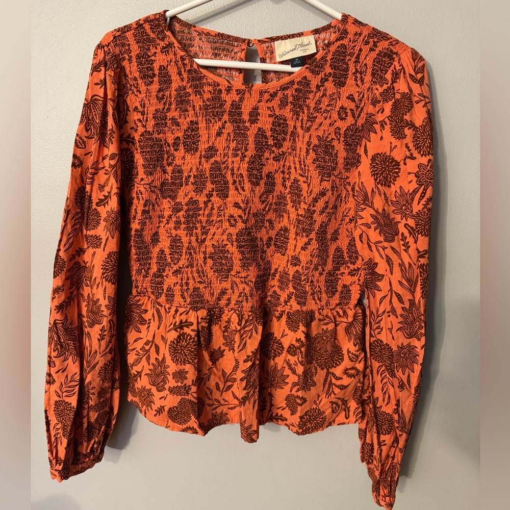 Burnt orange flowered blouse